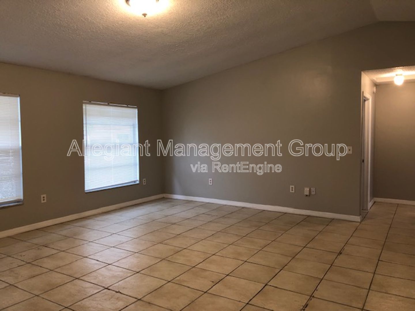 Spacious 3/2 Home In Poinciana With 2 Car garage & Screened Porch For Rent! property image