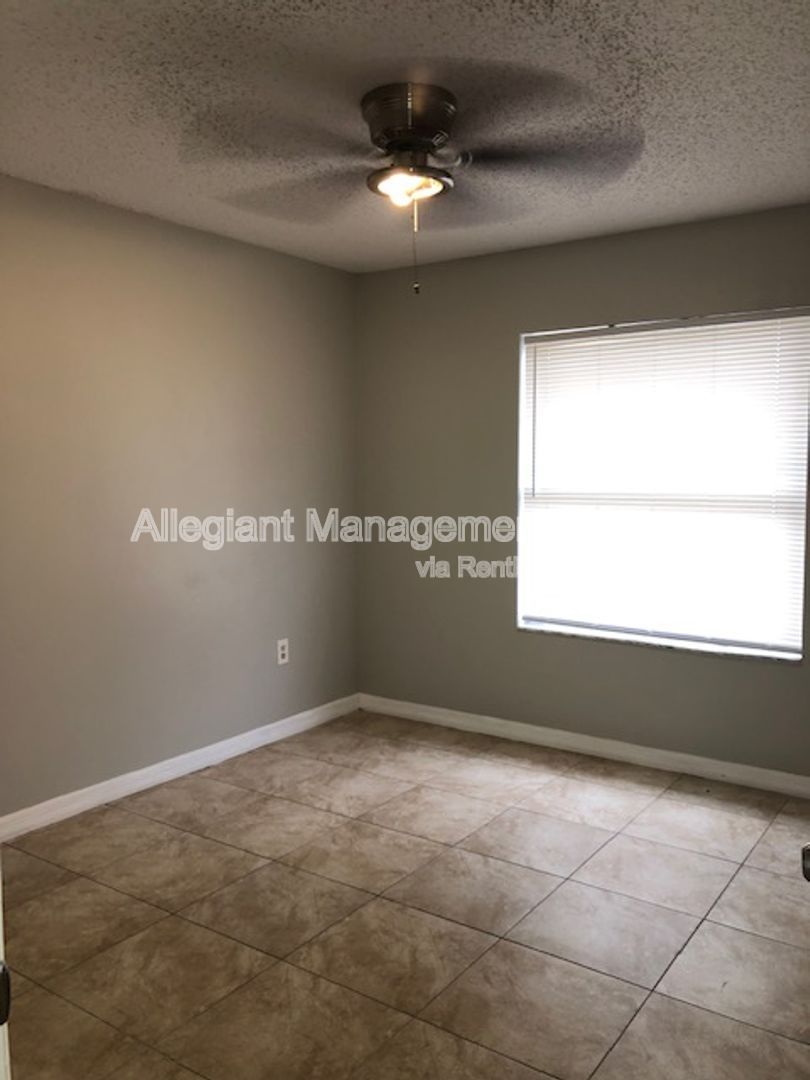 Spacious 3/2 Home In Poinciana With 2 Car garage & Screened Porch For Rent! property image