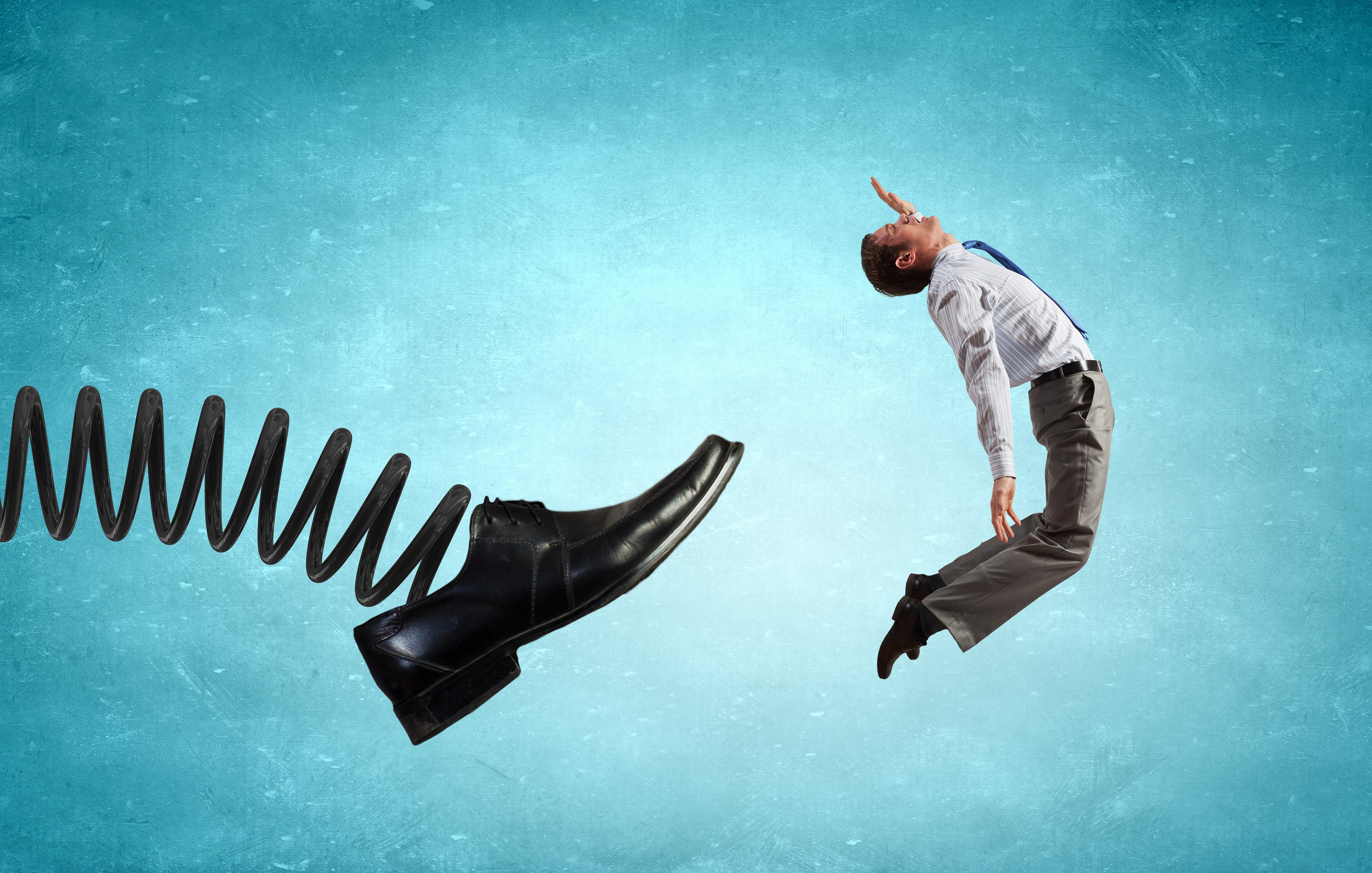 Illustration of a businessman being launched by a spring-loaded shoe, representing the dramatic firing of a property manager.