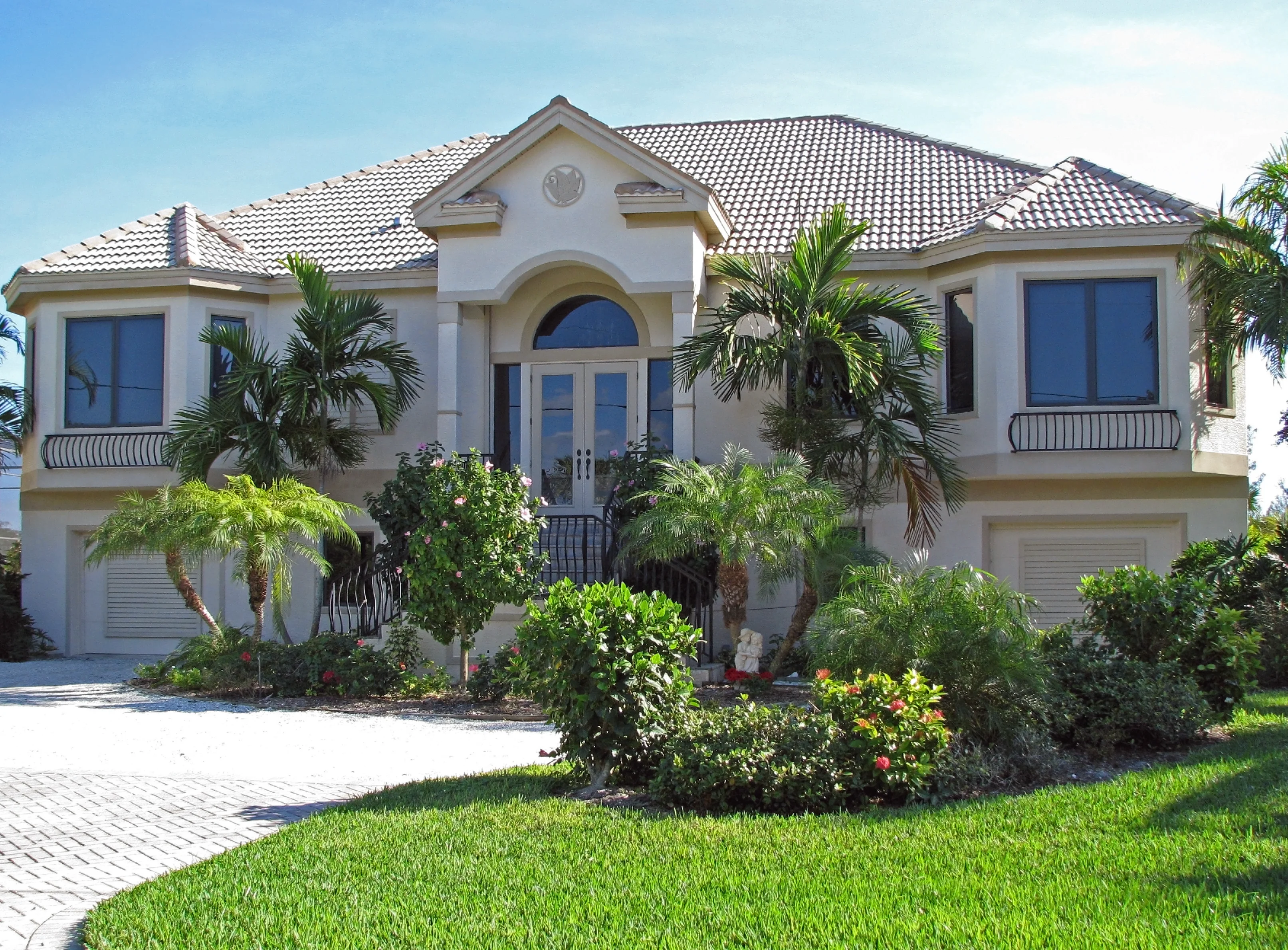 Luxury investment property in Kissimmee, Florida with tropical landscaping, ideal for real estate investors using Allegiant Management Group.