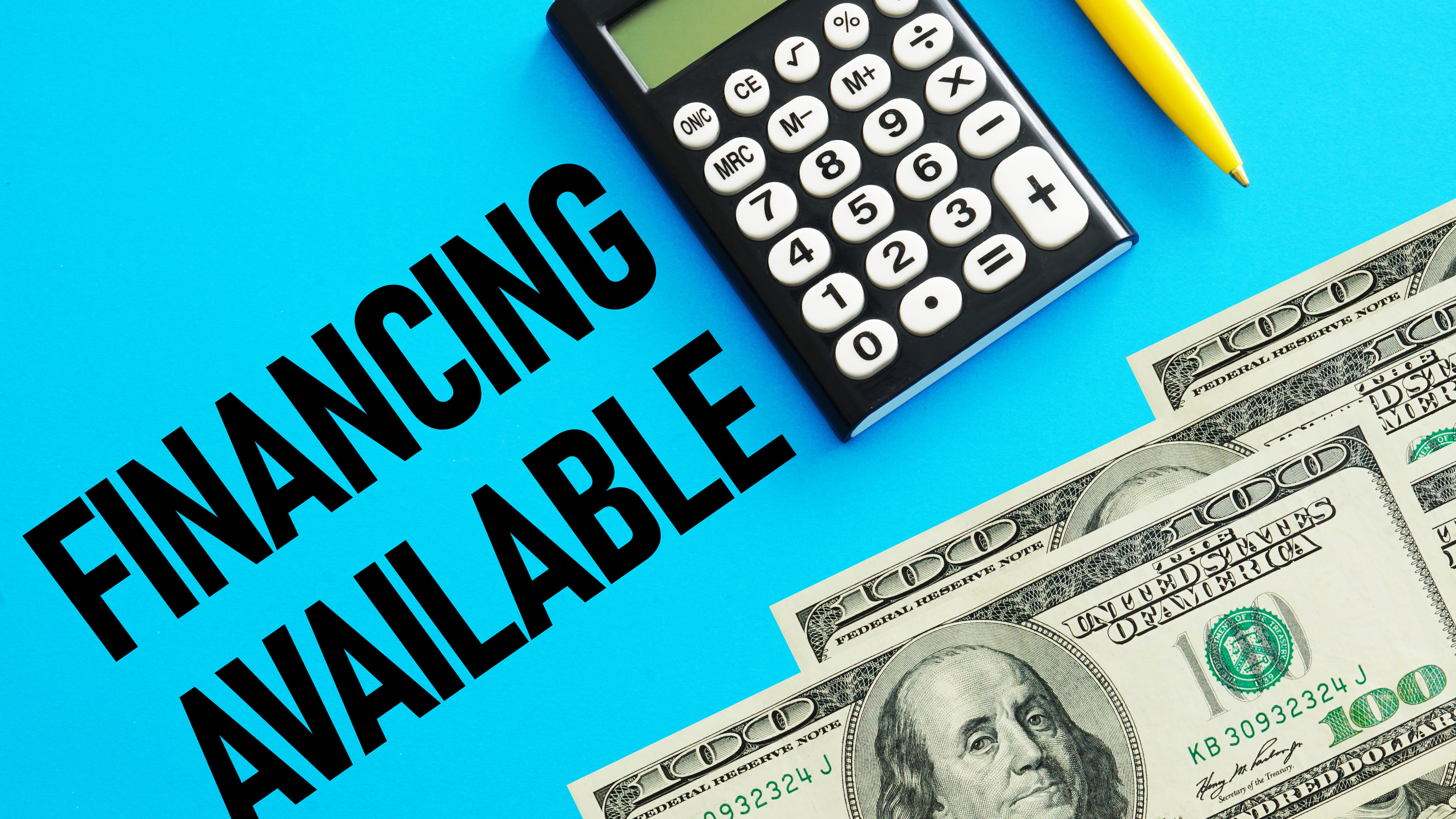 Calculator, hundred-dollar bills, and the phrase ‘Financing Available’ on a blue background representing real estate funding options.