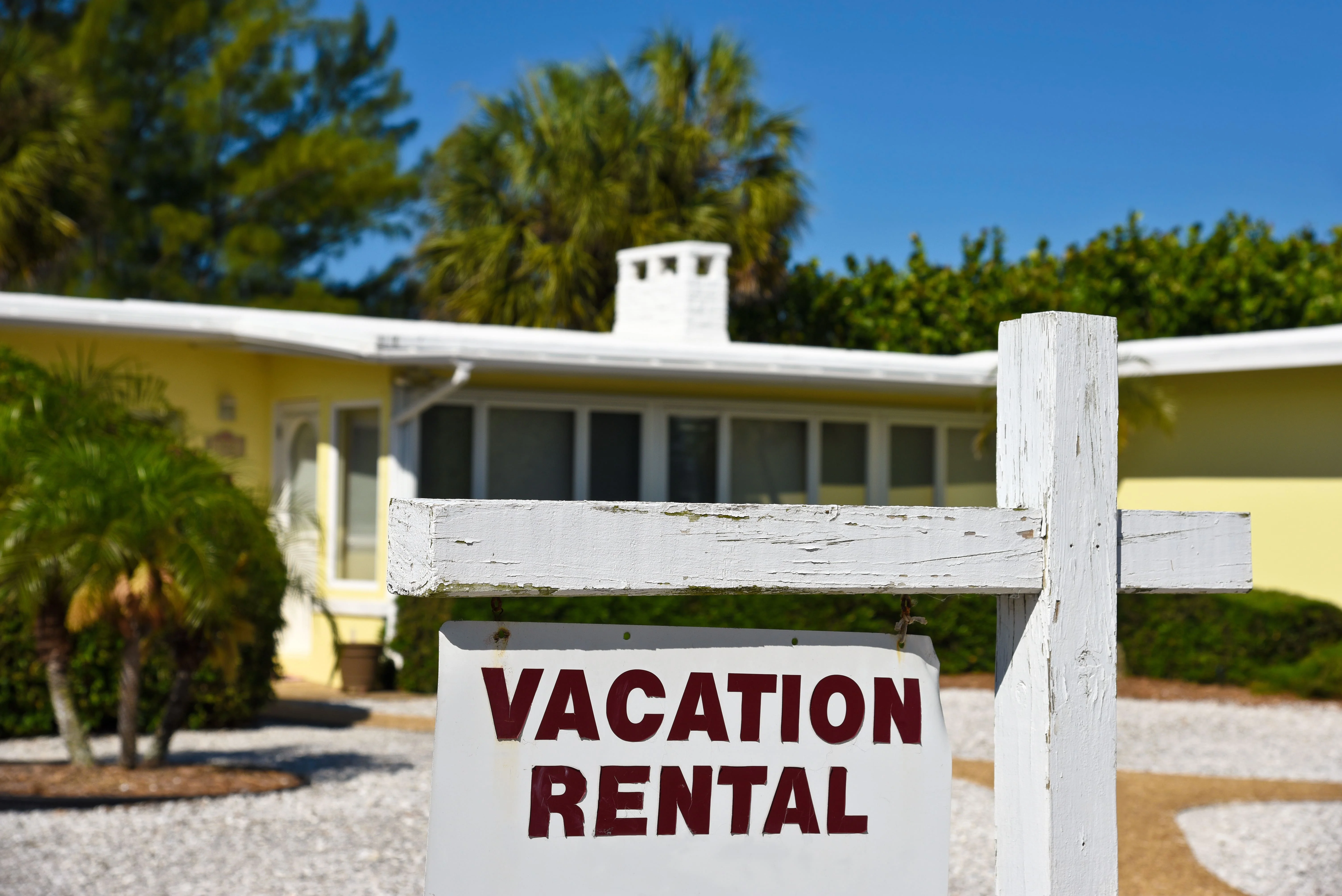 Vacation rental property in Kissimmee with sign, showing high-demand short-term rental investment opportunity near Disney—managed by Allegiant.